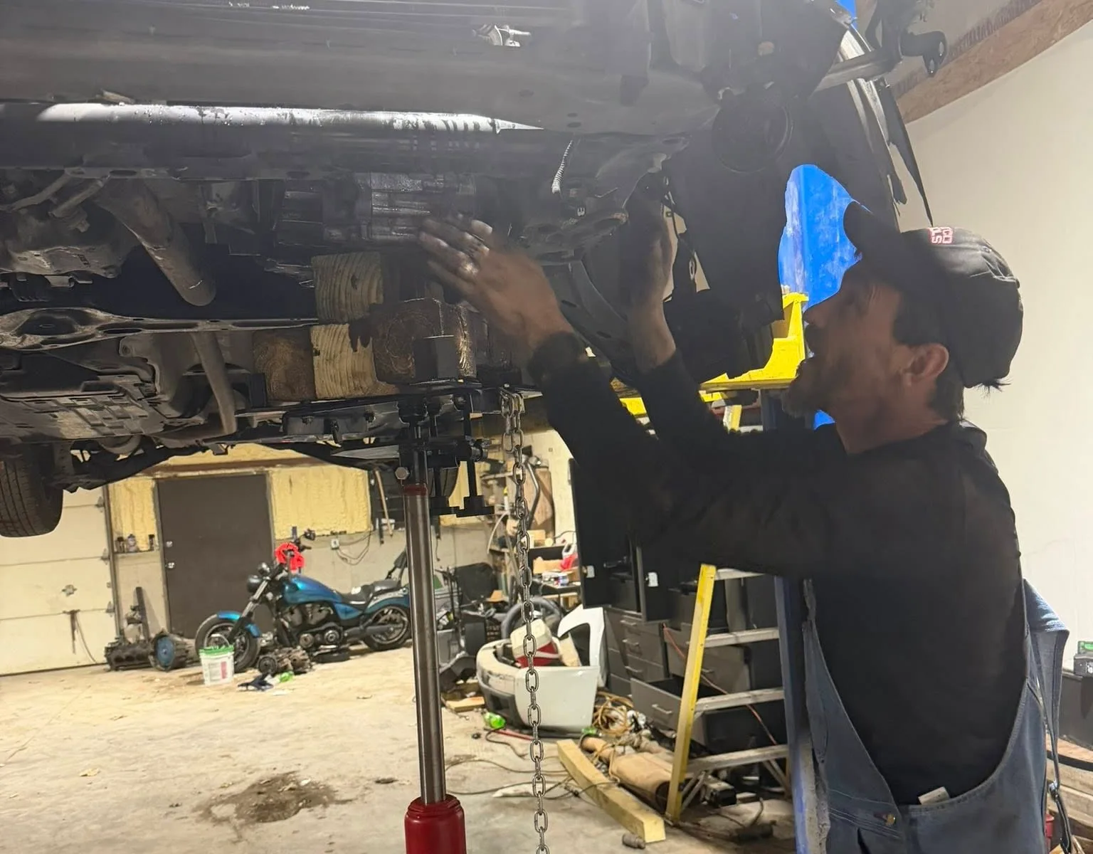 Background image of an industrial automotive repair shop